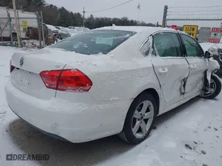 2012 Volkswagen Passat SE with VIN 1VWBP7A35CC052679, listed as a IAAI auction lot 41268199 with 125,691 mi miles. Bid and sale history available at carsss.com. Image 4.