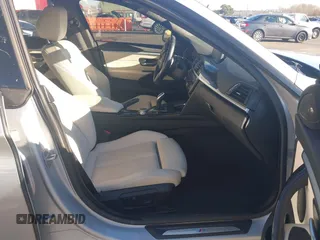 2015 BMW 4 Series 428i with VIN WBA4A5C58FG051293, listed as a IAAI auction lot 41255541 with 60,737 mi miles and . Bid and sale history available at DreamBid. Image 5.