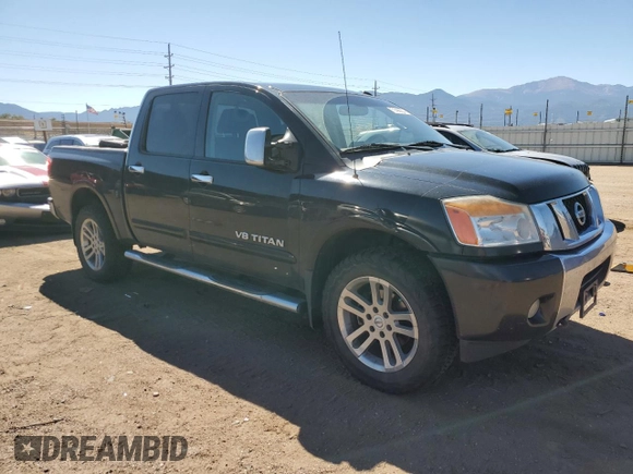 2014 Nissan Titan Pro-4X with VIN 1N6AA0EC2EN519983, listed as a Copart auction lot 71496934 with 150,259 mi miles and Salvage title. Bid and sale history available at DreamBid. Image 4.