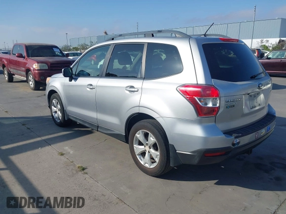 2014 Subaru Forester Premium with VIN JF2SJAEC5EH551632, listed as a IAAI auction lot 42640444 with 240,591 mi miles and . Bid and sale history available at DreamBid. Image 3.