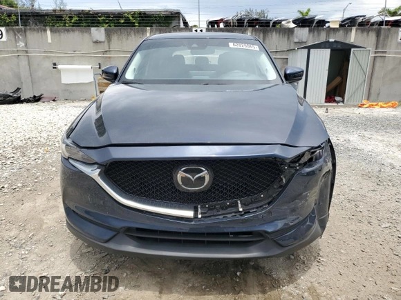 2021 Mazda CX-5 Grand Touring z VIN JM3KFBDM5M0464611, wystawiony jako Copart lot #62829065 z przebiegiem 20 525 mil mil oraz Nie do naprawy • Non repairable. Historia ofert i sprzedaży dostępna na DreamBid. Obrazek 5.