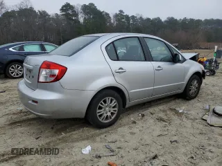 2012 Suzuki SX4 LE with VIN JS2YC5A39C6305357, listed as a Copart auction lot 84146324 with 163,097 mi miles and Salvage Title. Bid and sale history available at carsss.com. Image 3.