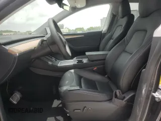 2024 Tesla Model Y Long Range с VIN 7SAYGDEE7RA279293, выставлен на аукционе Copart как лот 62758065 с пробегом 23 271 миль миль и Списание • Salvage title. История ставок и продаж доступна на DreamBid. Изображение 7.