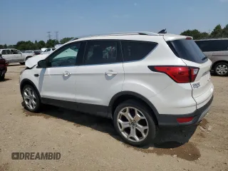 2019 Ford Escape Titanium z VIN 1FMCU9J93KUA51020, wystawiony jako Copart lot #60462495 z przebiegiem 59 998 mil mil oraz Szkoda całkowita • Salvage title. Historia ofert i sprzedaży dostępna na DreamBid. Obrazek 2.