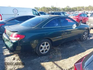 1999 Toyota Solara SE with VIN 2T1CF22P2XC152976, listed as a IAAI auction lot 41316334 with 240,623 mi miles. Bid and sale history available at carsss.com. Image 4.