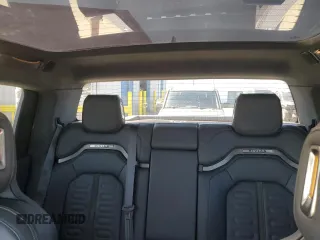 2022 Rivian R1T Adventure z VIN 7FCTGAAA5NN014843, wystawiony jako Copart lot #47668545 z przebiegiem 42 640 mil mil oraz Szkody całkowita. Historia ofert i sprzedaży dostępna na DreamBid. Obrazek 10.