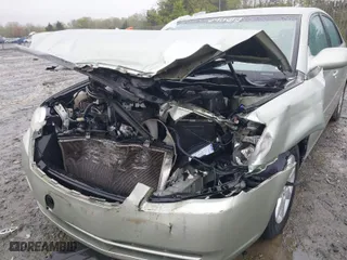 2007 Toyota Avalon XL with VIN 4T1BK36B27U236094, listed as a IAAI auction lot 42025285 with 208,741 mi miles. Bid and sale history available at carsss.com. Image 6.