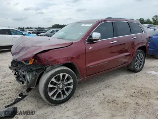 2017 Jeep Grand Cherokee Overland with VIN 1C4RJECG3HC868255, listed as a Copart auction lot 70207444 with 121,604 mi miles and Salvage Title. Bid and sale history available at carsss.com. Image 1.
