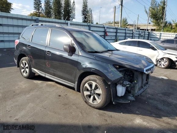 2017 Subaru Forester with VIN JF2SJABC5HH418569, listed as a Copart auction lot 87831935 with 119,973 mi miles and Salvage Title. Bid and sale history available at carsss.com. Image 4.