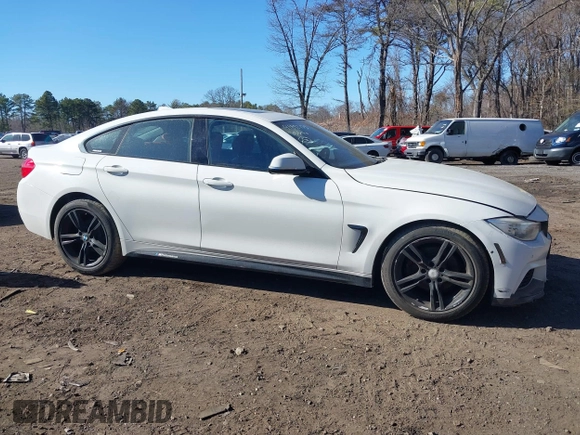 2015 BMW 4 Series 428i xDrive with VIN WBA4C9C51FD331298, listed as a IAAI auction lot 41892173 with 120,484 mi miles and . Bid and sale history available at DreamBid. Image 13.