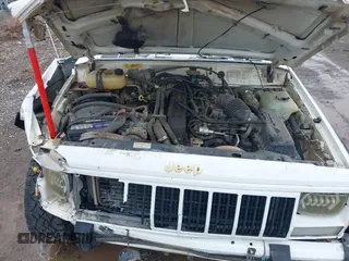 1990 Jeep Cherokee with VIN 1J4FJ78L0LL217723, listed as a IAAI auction lot 41788403 with 147,557 mi miles and . Bid and sale history available at DreamBid. Image 10.