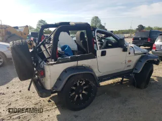 2003 Jeep Wrangler Rubicon z VIN 1J4FA69S53P375189, wystawiony jako Copart lot #54292035 z przebiegiem 55 863 mil mil oraz Szkoda całkowita • Salvage title. Historia ofert i sprzedaży dostępna na DreamBid. Obrazek 3.