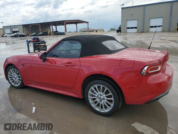2017 FIAT 124 Spider Lusso z VIN JC1NFAEKXH0102435, wystawiony jako Copart lot #54235675 z przebiegiem 84 343 mil mil oraz Szkoda całkowita • Salvage title. Historia ofert i sprzedaży dostępna na DreamBid. Obrazek 2.