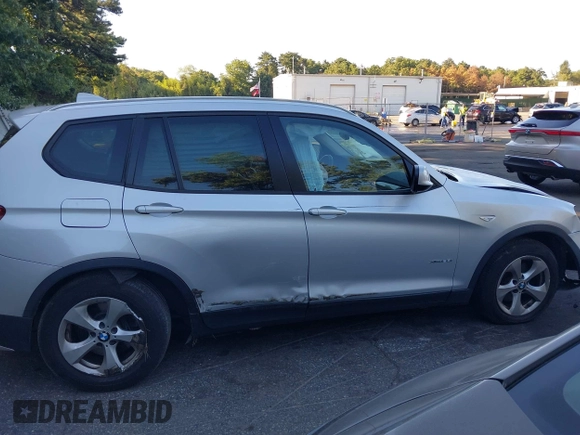 2011 BMW X3 28i with VIN 5UXWX5C5XBL706239, listed as a IAAI auction lot 40258614 with 143,079 mi miles. Bid and sale history available at carsss.com. Image 13.