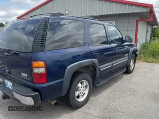 2002 Chevrolet Tahoe LS z VIN 1GNEC13Z92R180341, wystawiony jako Copart lot #59126715 z przebiegiem Nie podano mil oraz Czysty tytuł • Clean title. Historia ofert i sprzedaży dostępna na DreamBid. Obrazek 4.