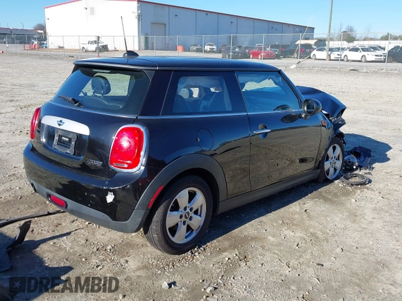 2014 MINI Hardtop with VIN WMWXM5C51ET972099, listed as a IAAI auction lot 41595497 with 113,496 mi miles and . Bid and sale history available at DreamBid. Image 4.