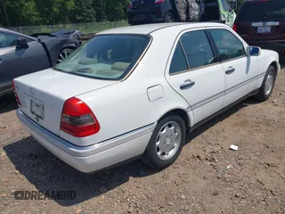 1997 Mercedes-Benz C with VIN WDBHA23E2VF504829, listed as a IAAI auction lot 42690662 with 266,074 mi miles and . Bid and sale history available at DreamBid. Image 4.