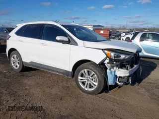 2019 Ford Edge SEL z VIN 2FMPK4J94KBB99418, wystawiony jako IAAI lot #41294393 z przebiegiem 57 706 mil mil oraz . Historia ofert i sprzedaży dostępna na DreamBid. Obrazek 1.