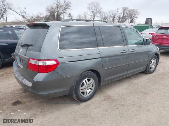 2007 Honda Odyssey EX-L with VIN 5FNRL386X7B423012, listed as a IAAI auction lot 41876854 with 266,588 mi miles. Bid and sale history available at carsss.com. Image 4.