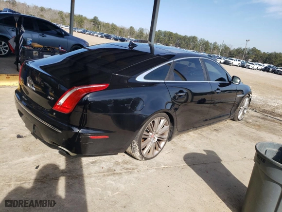 2015 Jaguar XJ with VIN SAJWA2GZ1F8V85688, listed as a Copart auction lot 43112915 with 0 mi miles and Salvage Title. Bid and sale history available at carsss.com. Image 3.