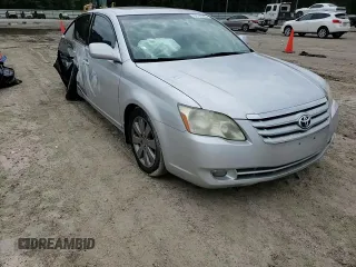 2006 Toyota Avalon XL z VIN 4T1BK36B36U066018, wystawiony jako Copart lot #56701295 z przebiegiem 231 694 mil mil oraz Szkoda całkowita • Salvage title. Historia ofert i sprzedaży dostępna na DreamBid. Obrazek 13.