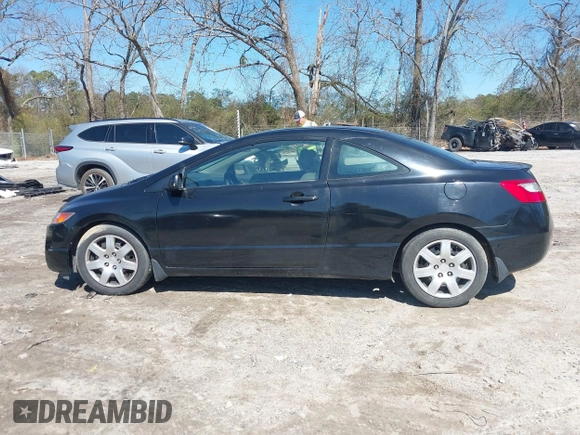 2009 Honda Civic Cpe LX with VIN 2HGFG12669H509744, listed as a IAAI auction lot 41777731 with 202,530 mi miles. Bid and sale history available at carsss.com. Image 13.