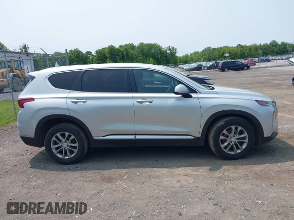 2019 Hyundai Santa Fe SE z VIN 5NMS2CAD2KH058961, wystawiony jako IAAI lot #42395683 z przebiegiem 81 228 mil mil oraz . Historia ofert i sprzedaży dostępna na DreamBid. Obrazek 13.