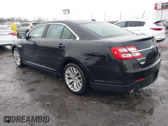2015 Ford Taurus Limited with VIN 1FAHP2F87FG146554, listed as a IAAI auction lot 41712502 with 103,117 mi miles. Bid and sale history available at carsss.com. Image 3.