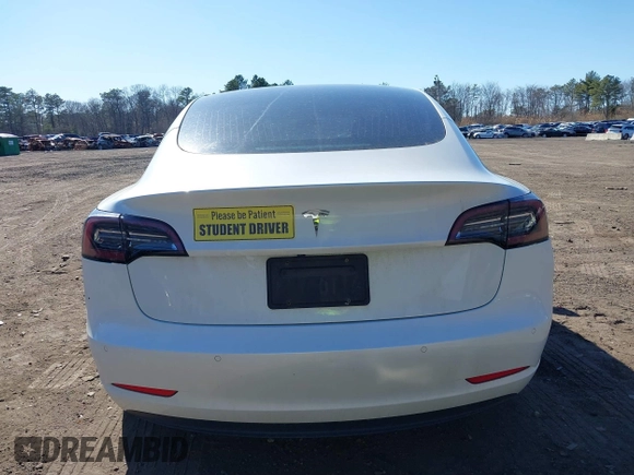2020 Tesla Model 3 Standard Range Plus with VIN 5YJ3E1EA0LF783672, listed as a IAAI auction lot 41903431 with 52,157 mi miles and . Bid and sale history available at carsss.com. Image 16.