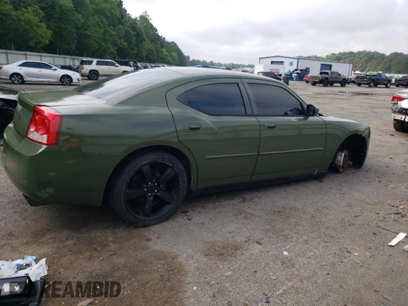 2010 Dodge Charger Police z VIN 2B3CA4CT7AH245139, wystawiony jako Copart lot #54257155 z przebiegiem 219 135 mil mil oraz Czysty tytuł • Clean title. Historia ofert i sprzedaży dostępna na DreamBid. Obrazek 3.