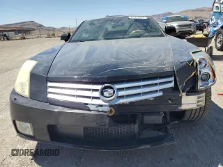 2004 Cadillac XLR z VIN 1G6YV34A345603061, wystawiony jako Copart lot #67412674 z przebiegiem 88 335 mil mil oraz Szkody całkowita. Historia ofert i sprzedaży dostępna na DreamBid. Obrazek 5.
