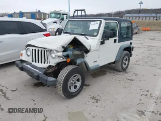 1998 Jeep Wrangler SE with VIN 1J4FY29P9WP793260, listed as a IAAI auction lot 41596990 with 90,766 mi miles. Bid and sale history available at carsss.com. Image 2.