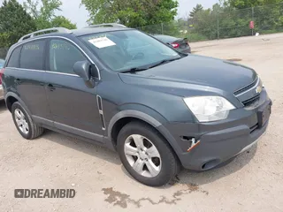 2013 Chevrolet Captiva Sport LS z VIN 3GNFL2EK9DS518461, wystawiony jako IAAI lot #42483746 z przebiegiem 159 440 mil mil oraz . Historia ofert i sprzedaży dostępna na DreamBid. Obrazek 1.
