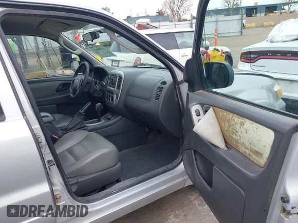 2005 Ford Escape Hybrid with VIN 1FMCU95H05KC95225, listed as a IAAI auction lot 41798610 with 216,659 mi miles and . Bid and sale history available at DreamBid. Image 5.