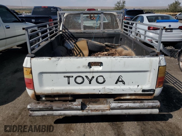 1994 Toyota Pickup z VIN 4TARN81A3RZ166726, wystawiony jako Copart lot #73611754 z przebiegiem 247 038 mil mil oraz Czysty tytuł • Clean title. Historia ofert i sprzedaży dostępna na DreamBid. Obrazek 6.