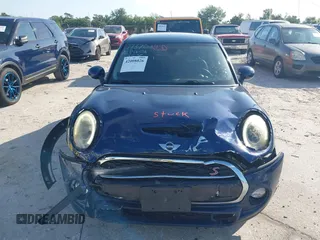 2016 MINI Cooper Hardtop 4 Door S with VIN WMWXU3C54G2D30766, listed as a IAAI auction lot 42008026 with 101,898 mi miles. Bid and sale history available at carsss.com. Image 12.
