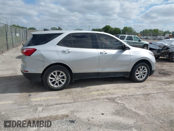 2018 Chevrolet Equinox LS with VIN 2GNAXHEV1J6110087, listed as a IAAI auction lot 42175959 with 124,611 mi miles and . Bid and sale history available at DreamBid. Image 13.