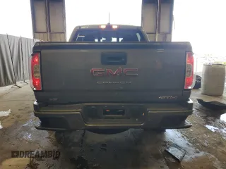 2022 GMC Canyon 4WD AT4 z VIN 1GTG6FEN0N1162393, wystawiony jako Copart lot #55286065 z przebiegiem 55 185 mil mil oraz Szkoda całkowita • Salvage title. Historia ofert i sprzedaży dostępna na DreamBid. Obrazek 6.