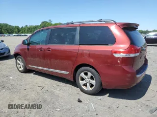 2012 Toyota Sienna LE AAS с VIN 5TDKK3DC0CS183801, выставлен на аукционе Copart как лот 58258035 с пробегом 291 299 миль миль и Чистый • Clean title. История ставок и продаж доступна на DreamBid. Изображение 2.