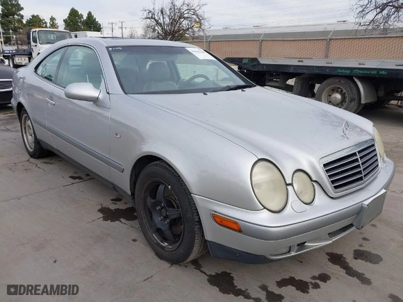 1998 Mercedes-Benz CLK-Class with VIN WDBLJ65G7WF030460, listed as a IAAI auction lot 41633288 with 327,848 mi miles. Bid and sale history available at carsss.com. Image 1.