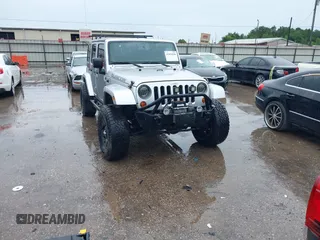 2012 Jeep Wrangler Unlimited Call of Duty MW3 with VIN 1C4BJWFG7CL281844, listed as a IAAI auction lot 42494946 with 93,669 mi miles and . Bid and sale history available at DreamBid. Image 1.