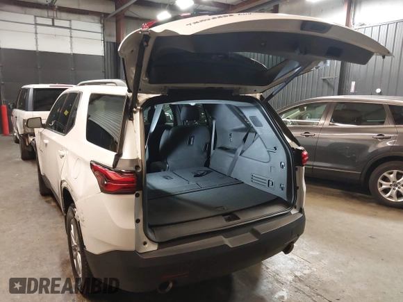 2023 Chevrolet Traverse LT Cloth with VIN 1GNEVGKW4PJ332410, listed as a IAAI auction lot 42001073 with 23,453 mi miles and . Bid and sale history available at DreamBid. Image 3.