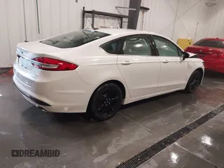 2018 Ford Fusion SE z VIN 3FA6P0HD9JR231970, wystawiony jako IAAI lot #41549490 z przebiegiem 99 803 mil mil oraz . Historia ofert i sprzedaży dostępna na DreamBid. Obrazek 4.