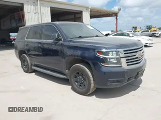 2020 Chevrolet Tahoe Commercial z VIN 1GNLCDEC5LR158243, wystawiony jako IAAI lot #42416695 z przebiegiem 98 666 mil mil oraz . Historia ofert i sprzedaży dostępna na DreamBid. Obrazek 1.