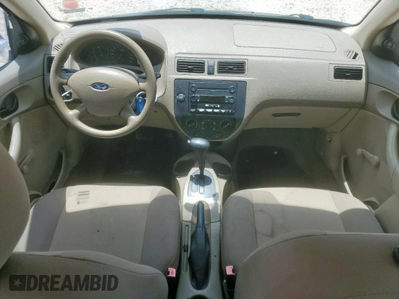 2006 Ford Focus S with VIN 1FAFP34N26W225772, listed as a Copart auction lot 62657045 with 117,078 mi miles and Salvage title. Bid and sale history available at DreamBid. Image 8.