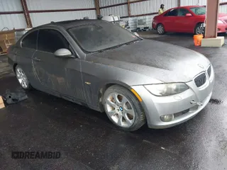 2007 BMW 3 Series 335i with VIN WBAWB73507P035348, listed as a IAAI auction lot 41957831 with 156,943 mi miles and . Bid and sale history available at carsss.com. Image 1.