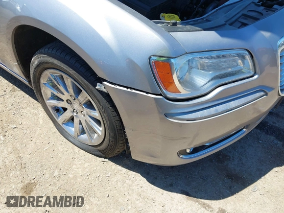 2014 Chrysler 300 with VIN 2C3CCAAG8EH264595, listed as a IAAI auction lot 42076996 with 101,659 mi miles and . Bid and sale history available at DreamBid. Image 20.