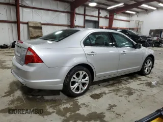 2012 Ford Fusion SE z VIN 3FAHP0HA5CR371175, wystawiony jako Copart lot #52073675 z przebiegiem 135 813 mil mil oraz Czysty tytuł • Clean title. Historia ofert i sprzedaży dostępna na DreamBid. Obrazek 3.