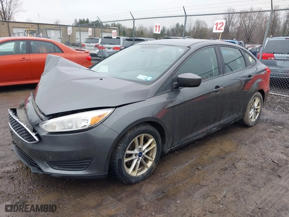 2018 Ford Focus SE with VIN 1FADP3F23JL298265, listed as a IAAI auction lot 42005754 with 134,721 mi miles. Bid and sale history available at carsss.com. Image 18.