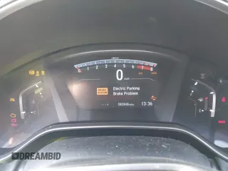 2019 Honda CR-V EX-L with VIN JHLRW2H81KX006771, listed as a IAAI auction lot 41670636 with 82,848 mi miles. Bid and sale history available at carsss.com. Image 7.